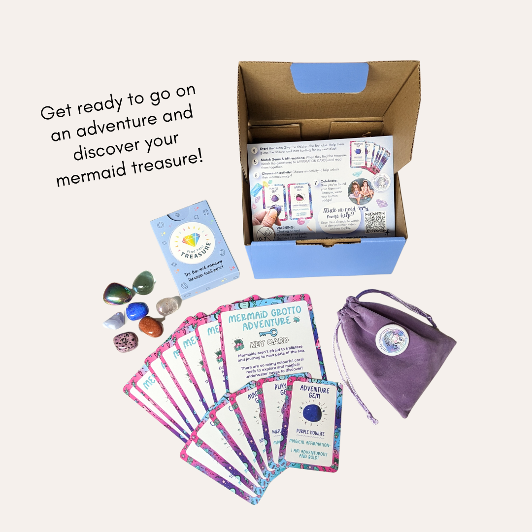 Mermaid-themed educational kit and treasure hunt game with Affirmation Cards, gemstones, and a velvet pouch on a white background